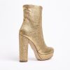 Caviar boot gold shiny leather