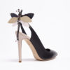 Pump high heel woman shoe leather with a dragonfly emblellishment